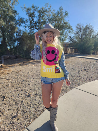 Smile face sweater on denim