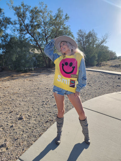 Smile face sweater on denim