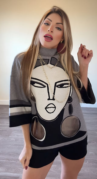 Túnica superior con cara plateada